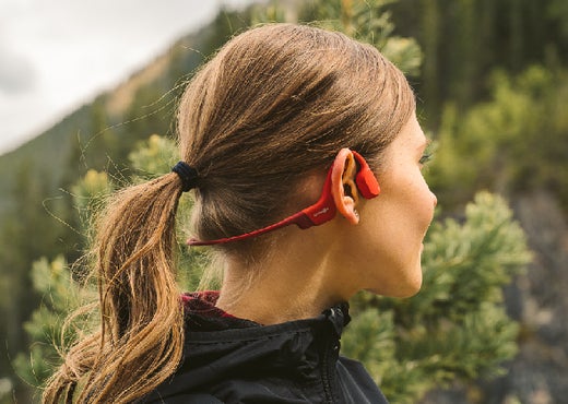 Enjoy nature with AfterShokz open-ear headphones for hiking