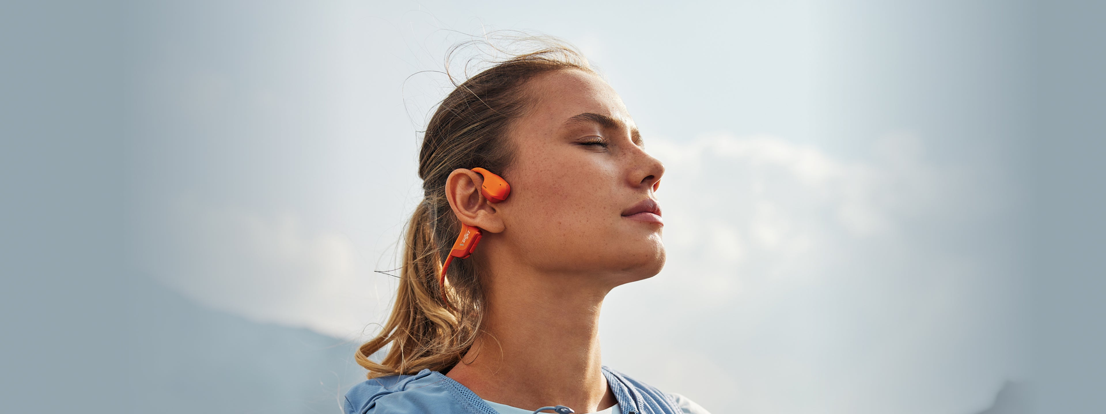 a person listening to music with headphones