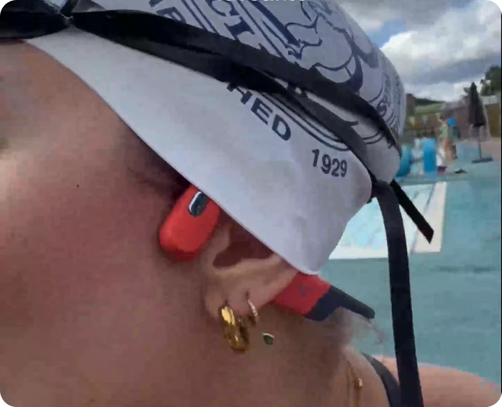 Shokz OpenSwim Pro waterproof headphones for swimming during long-distance pool workouts